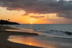Coucher de soleil sur la plage de la Perle